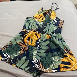 SHEIN Brand romper Size M. Green, yellow, navy blue design.